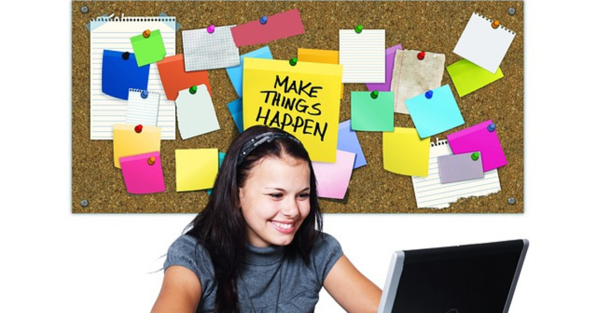 A teenager using a laptop to highlight the importance of mentorship in career building