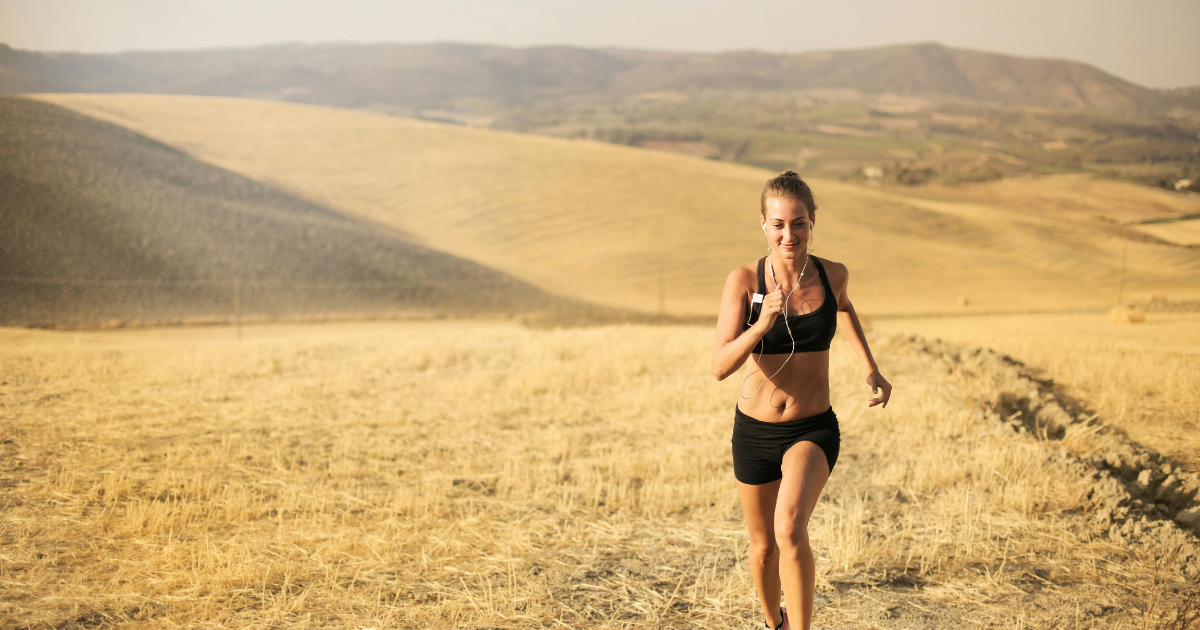 A determined woman running, symbolizing the pursuit of change and transformation.