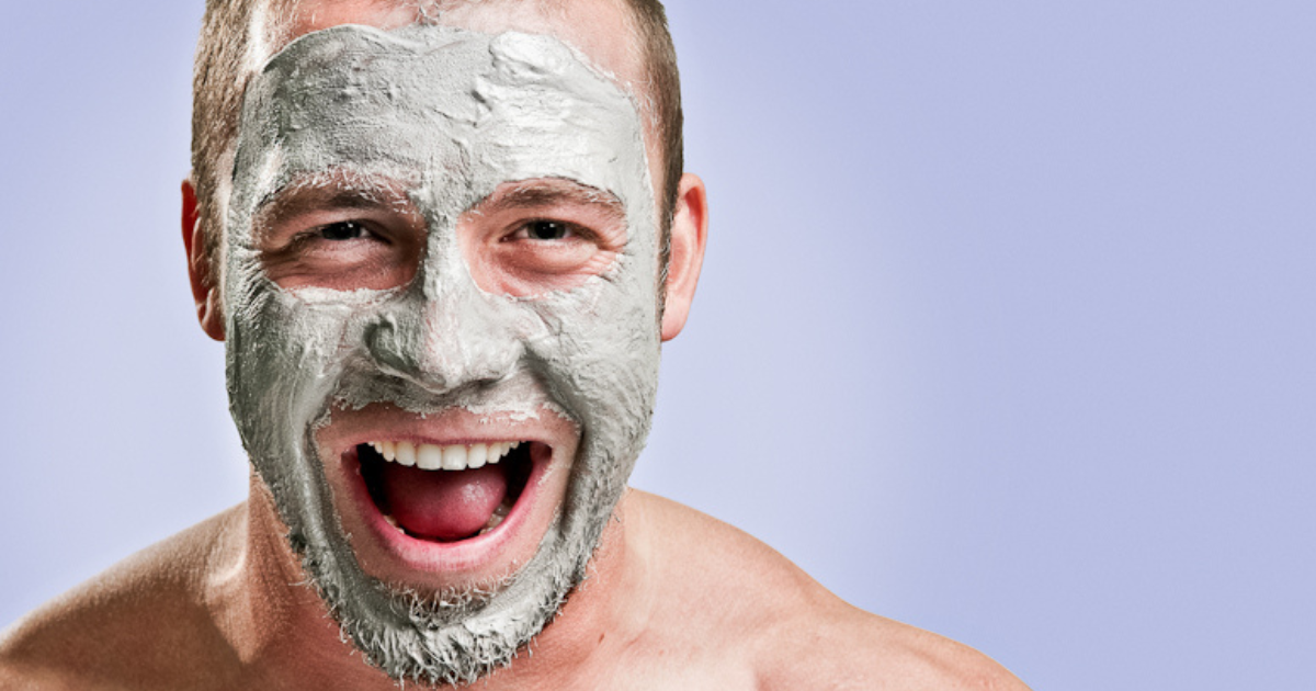 Image: Man with a joyful expression wearing a beauty face mask.