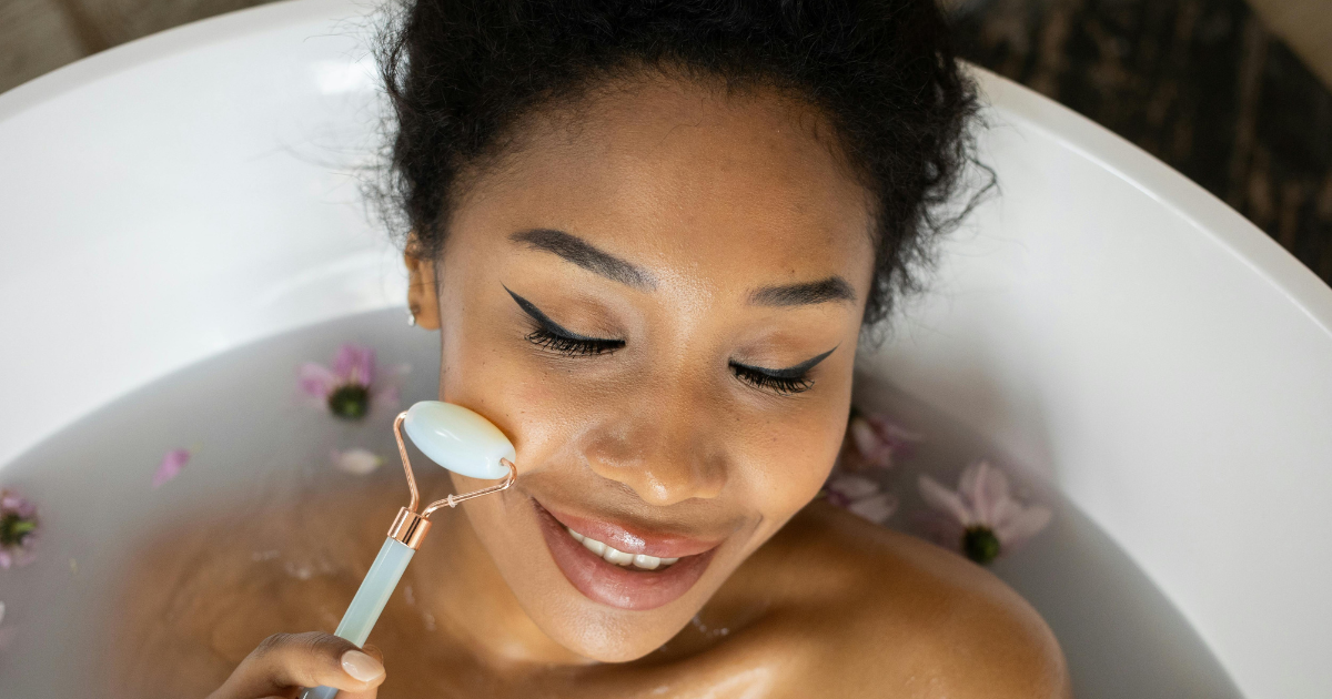 Image: Woman relaxing in home spa bath.