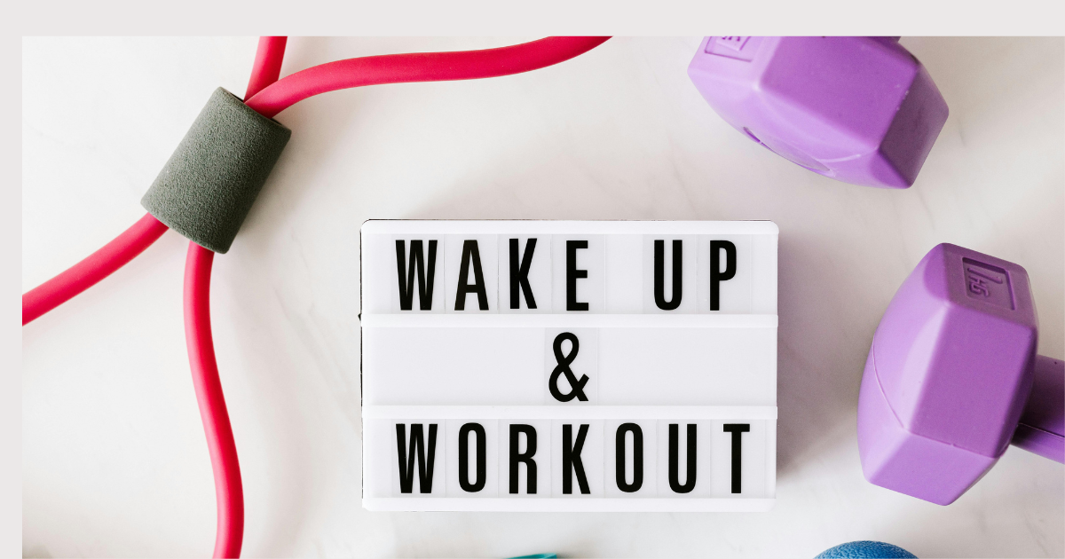 Image of fitness equipment with the text message 'Wake up and work out