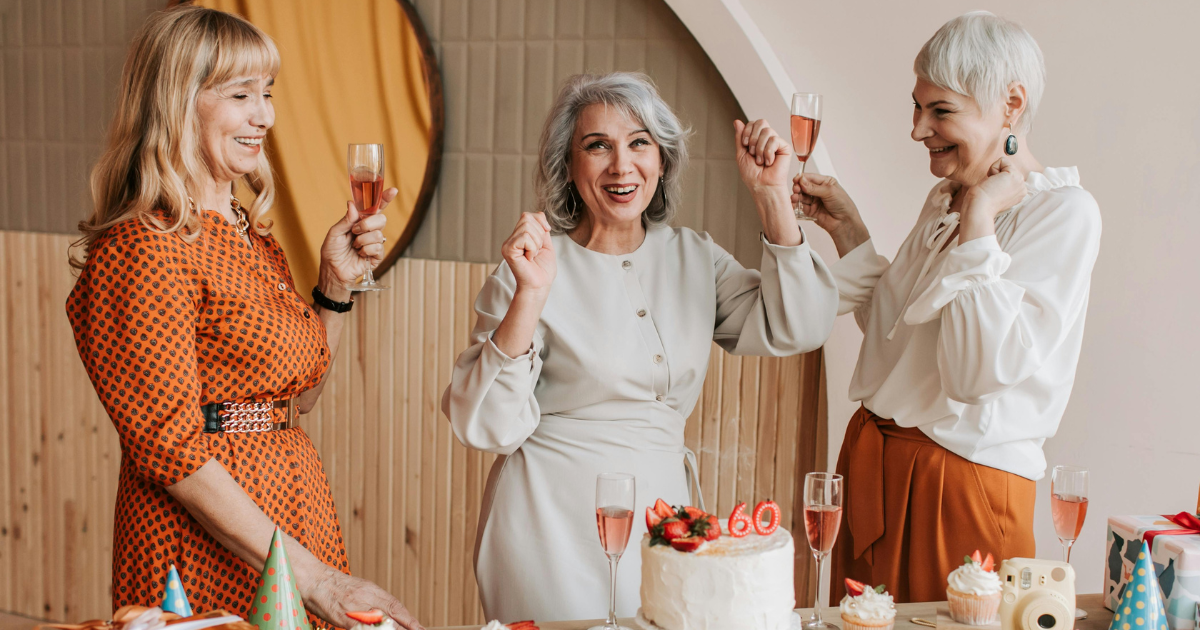 Three elderly women rejoicing in the moment